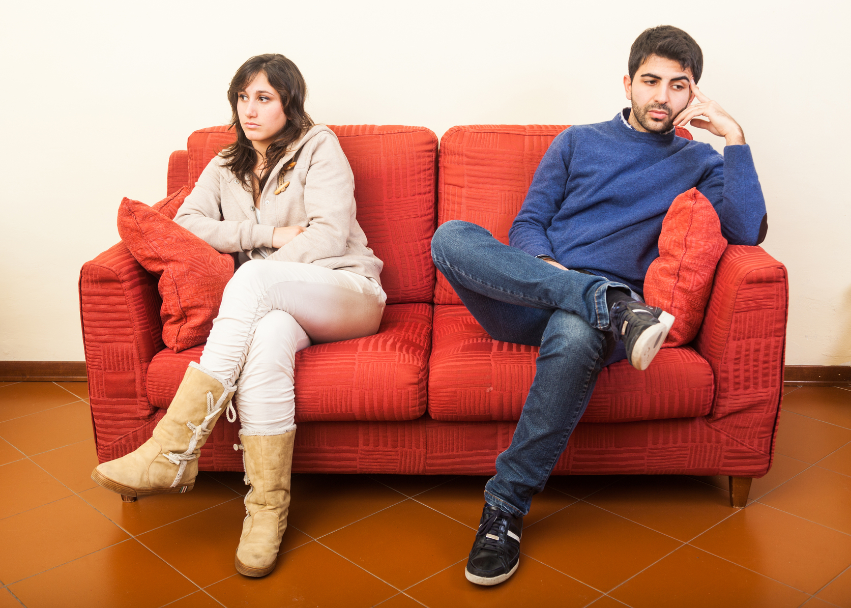 Young Couple on the Sofa after Quarrel
